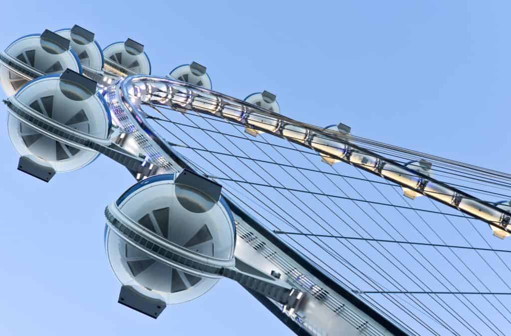 View from under a massive ferris wheel. 
